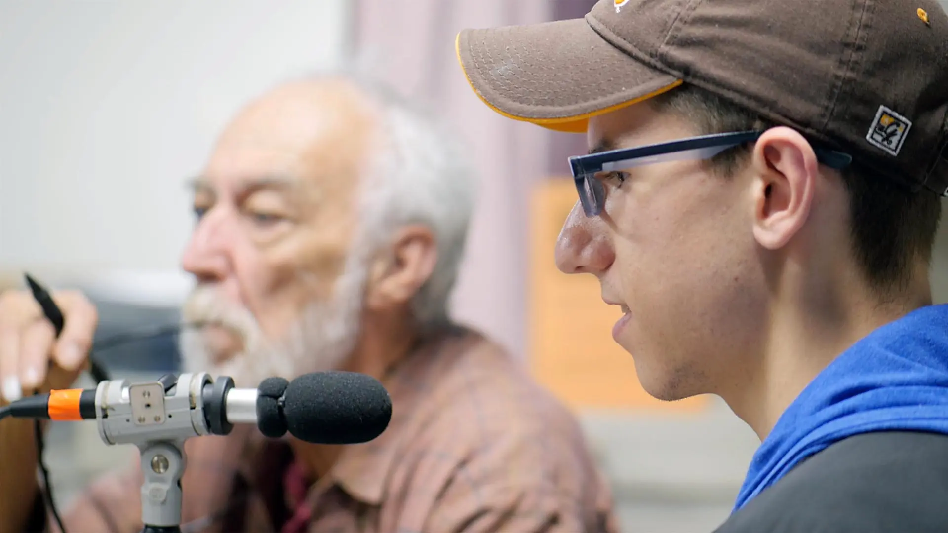 man at microphone